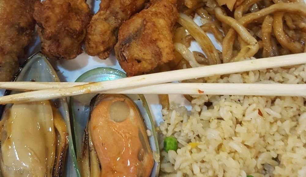 A plate with fried chicken at Dragon Buffet