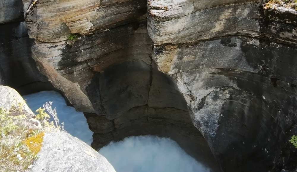Mistaya Canyon, this is a must-see stop on the Icefields Parkway for breathtaking views and dramatic scenery.