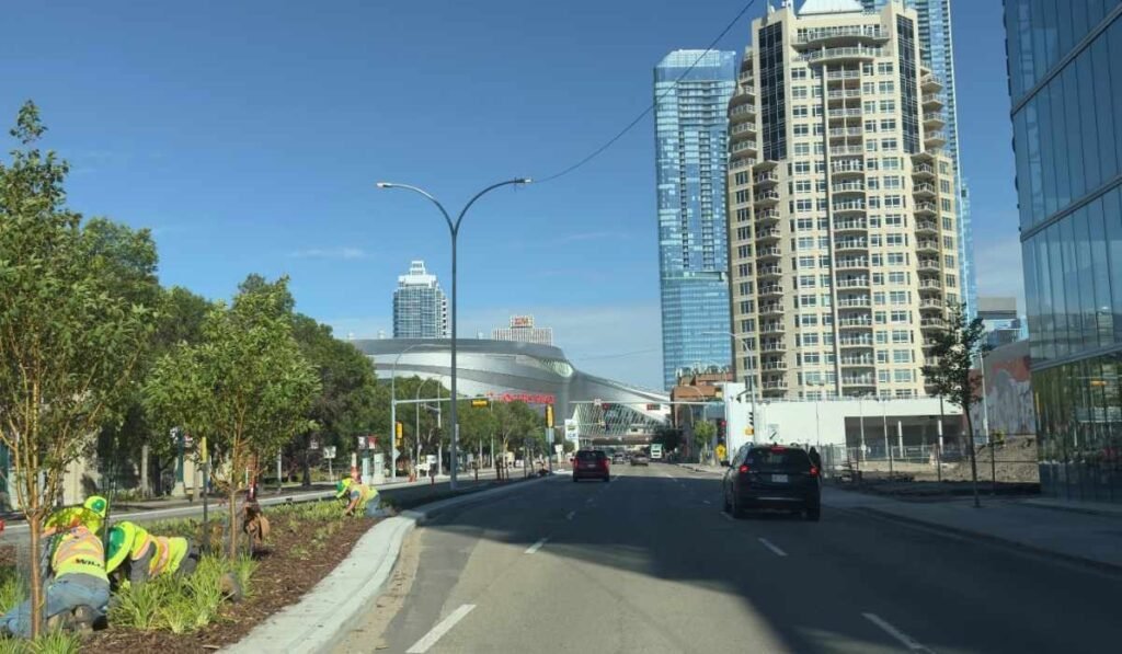 Downtown Edmonton skyline with Rogers Place along a city street: One of the best Edmonton areas to visit.